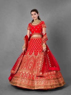 This Beautiful Heavy Designer Lehenga Choli Is Red Color. This Attractive Embroidered Lehenga Choli Is Fabricated On Satin Paired With Soft Net Fabricated Dupatta. It Is Light In Weight And Easy To Carry All Day Long.