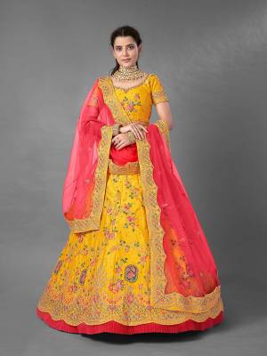 This Beautiful Heavy Designer Lehenga Choli Is Yellow Color. This Attractive Embroidered Lehenga Choli Is Fabricated On Art Silk Paired With Soft Net Fabricated Dupatta. It Is Light In Weight And Easy To Carry All Day Long.