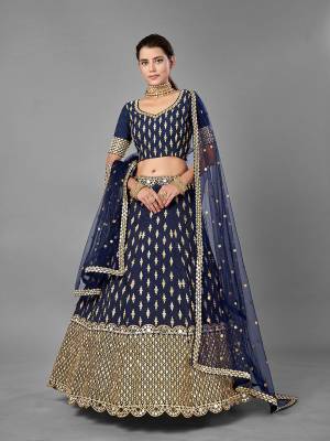 Evergreen Combination Is Here With This Heavy Designer Lehenga Choli In Nevy Blue Color. Its Blouse And Lehenga Are Fabricated On Art Silk Paired With Soft Net Fabricated Dupatta. Buy Now