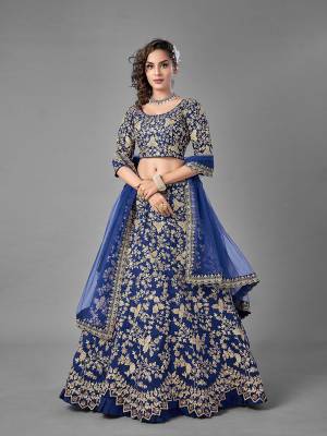 Evergreen Combination Is Here With This Heavy Designer Lehenga Choli In Blue Color. Its Blouse And Lehenga Are Fabricated On Art Silk Paired With Soft Net Fabricated Dupatta. Buy Now