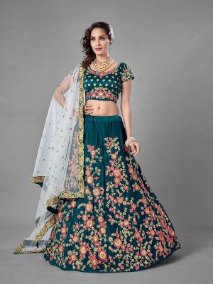 Evergreen Combination Is Here With This Heavy Designer Lehenga Choli In Rama Color. Its Blouse And Lehenga Are Fabricated On Satin Velvet Paired With Soft Net Fabricated Dupatta. Buy Now