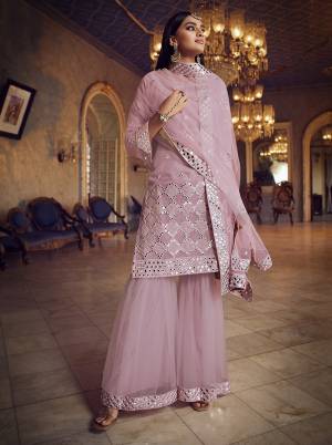 Get Ready For The Upcoming Festive And Wedding Season Wearing This Heavy Designer Embroidery With Foil Mirror Work Sharara Suit In Light Color. Its Top Are Fabricated Organza And Bottom And Dupatta Are Fabricated on Soft Net. Buy Now.