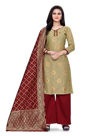 Lovelly Look This Designer Wevon Jacquard Designer Dress Material In Fine Colored Top Paired With Dupatta Are Banarasi Jacquard Silk And Bottom Are Tapeta Silk. 