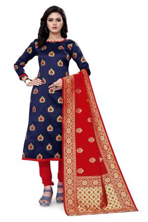 Lovelly Look This Designer Wevon Jacquard Designer Dress Material In Fine Colored Top Paired With Dupatta Are Banarasi Jacquard Silk And Bottom Are Tapeta Silk. 