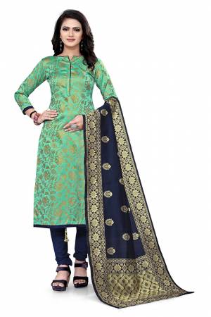 Attrective Look This Designer Wevon Jacquard Designer Dress Material In Fine Colored Top Paired With Dupatta Are Banarasi Jacquard Silk And Bottom Are Tapeta Silk. 