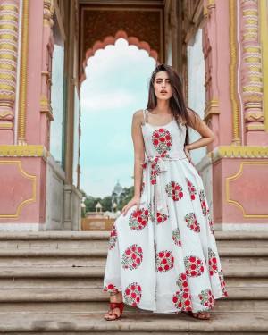 Your Rich And Elegant Taste Wearing This Designer Readymade Long Gown In White Color. This  Pretty Gown Is Fabricated On Maslin with Cotton Crepe Inner Beautified With Digital Printed With Matching Mask. Its Fabric Is Soft Towards Skin And Easy To Carry All Day Long. 