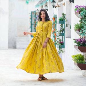 Attrecive Look This Readymade Long Kurti In Lemon Yellow Color Fabricated On Maslin Silk With Cotton Crepe Inner Beautified With Digital Prined. It Is Light In Weight And Easy To Carry All Day Long. 