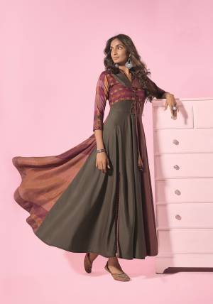Flaunt Your Rich And Elegant Taste Wearing This Designer Readymade Long Gown In English Color. This  Pretty Gown Is Fabricated On Blend Cotton Beautified With Designer Printed. Its Fabric Is Soft Towards Skin And Easy To Carry All Day Long. 