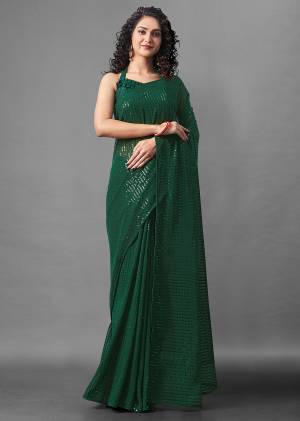 Attrective Look This Pretty Elegant Looking Designer Party Wear Saree In Green Color Paired With Blouse. This Saree Are Georgette And Blouse Are Banglori Silk Based With Designer Sequance Embroidery Work Beautified Saree. Buy Now.