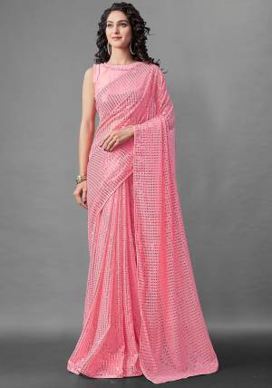 Attrective Look This Pretty Elegant Looking Designer Party Wear Saree In Pink Color Paired With Blouse. This Saree Are Georgette And Blouse Are Banglori Silk Based With Designer Sequance Embroidery Work Beautified Saree. Buy Now.