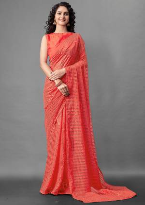 Attrective Look This Pretty Elegant Looking Designer Party Wear Saree In Tamato Red Color Paired With Blouse. This Saree Are Georgette And Blouse Are Banglori Silk Based With Designer Sequance Embroidery Work Beautified Saree. Buy Now.