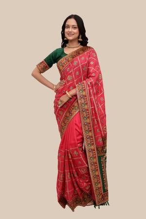 Celebrate This Festive Season In This Very Pretty Patola Designer Saree Paired With Contrasting Blouse. This Saree Are Soft Silk and Blouse Are Fentam Silk Based Beautified With Detailed Heavy Embroidery With Diamond Work And Latkan. 