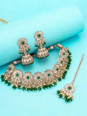 Give An Enhanced Look To Your Personality By Pairing Up This Beautiful Nacklace Set With Your Ethnic Attire. This Pretty Set Is In Multi Color Beautified With Kundan Work. Buy Now.