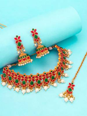 Give An Enhanced Look To Your Personality By Pairing Up This Beautiful Nacklace Set With Your Ethnic Attire. This Pretty Set Is In Multi Color Beautified With Kundan Work. Buy Now.