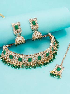 Give An Enhanced Look To Your Personality By Pairing Up This Beautiful Nacklace Set With Your Ethnic Attire. This Pretty Set Is In Multi Color Beautified With Kundan Work. Buy Now.