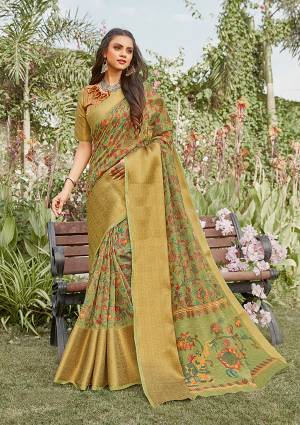 Celebrate This Festive Season In This Very Pretty Fancy Colored Designer Saree Paired With Blouse. This Saree and Blouse Are Linen Based Beautified With Detailed Wevon Pallu Border And Digital Printed Saree. 