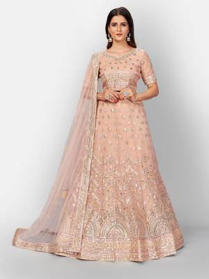 Attrective Look  Heavy Designer Bridal Lehenga Choli In Fine Color. This Heavy Embroidered Lehenga Choli Is  Organza Based Paired With Soft Net Fabricated Dupatta, It Is Beautified With Lovely Detailed Multy Thread Foil Miror Embroidery Work Giving An Attractive Look.