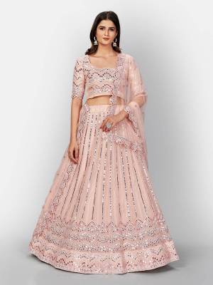 Attrective Look  Heavy Designer Bridal Lehenga Choli In Fine Color. This Heavy Embroidered Lehenga Choli Is  Organza Based Paired With Soft Net Fabricated Dupatta, It Is Beautified With Lovely Detailed Multy Thread Foil Miror Embroidery Work Giving An Attractive Look.