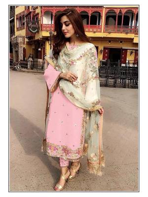 Attrective Look This Designer Suit In Fine Color Paired With Dupatta. Its Heacy Embroidery And Moti Work Top Is Fabricated On Faux Georgette Paired With Santoon Bottom And Soft Net Fabricated Dupatta. Buy this Suit Now.