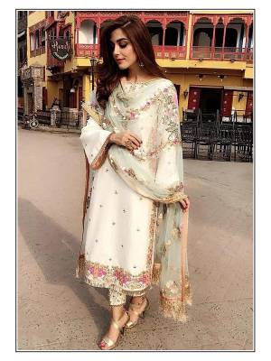 Attrective Look This Designer Suit In Fine Color Paired With Dupatta. Its Heacy Embroidery And Moti Work Top Is Fabricated On Faux Georgette Paired With Santoon Bottom And Soft Net Fabricated Dupatta. Buy this Suit Now.