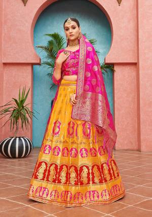 Attrective Look This Heavy Designer Lehenga Choli In Fine Color. This Stylist Designer Wevon Work Lehenga Choli And Dupatta Is Banarasi Silk Based Fabric. It Is Beautified With Lovely Attractive Look.