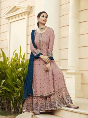 Look Pretty This Designer Long Length Suit In Lovely Fine Light Color.?Its Pretty Heavy Designer Embroidred,Real Mirror,Diamond Work Top Is Faux Georgette Based Paired With Dull Santoon Bottom And Faux Georgette Fabricated Work Dupatta Which Gives An Attractive To The Suit.