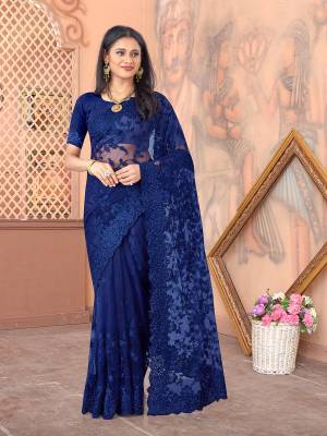 Garb This Partywear Saree Are Fine Saree Paired With Blouse.This Heavy Designer Thread Embroidery,Moti & Stone Work Saree And Blouse Are Net Based Fabric With Inner Satin. Buy This Pretty Saree Now.