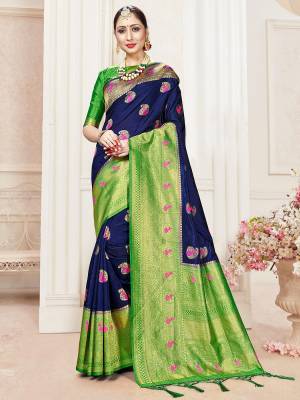 Attractive Wearing This Fine Colored Saree Paired With Contreased Blouse.This Heavy Designer Wevon Saree Is Banarasi Silk Based Which Gives A Rich Look To Your Personality. Buy This Pretty Saree Now.