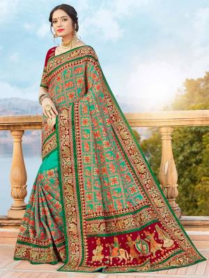 Attrective This Traditinol Look Fine Colored Saree Paired With Contreased Blouse.This Heavy Designer Embroidery With Diamond Work Saree Is Satin Silk Based Which Gives A Rich Look To Your Personality. Buy This Pretty Saree Now.