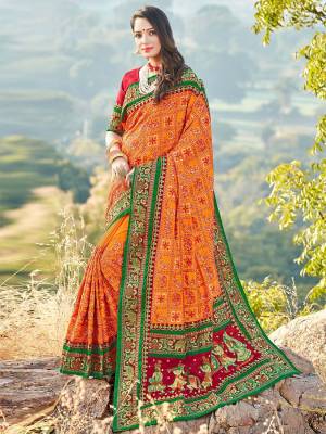 Attrective This Traditinol Look Fine Colored Saree Paired With Contreased Blouse.This Heavy Designer Embroidery With Diamond Work Saree Is Satin Silk Based Which Gives A Rich Look To Your Personality. Buy This Pretty Saree Now.