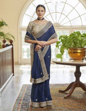 Look Attrectiv This Partywear Saree Are Fine Saree Paired With Blouse.This Saree Are Organza And Blouse Are Organza Fabric With Heavy Designer Work Based. Buy This Pretty Saree Now.