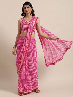 Garb This Saree Are Fine Saree Paired With Blouse.This Saree Are Georgette And Blouse Are Georgette Fabric With Designer Lahariya Printed. Buy This Pretty Saree Now.