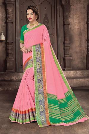 Looking This Traditional Saree Are Fine Saree Paired With Blouse.This Saree And Blouse Are Handloom Cotton Based Fabric With Heavy Wevon Designer Work. Buy This Pretty Saree Now.