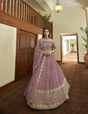 Look Attrective Partywear Heavy Designer Lehenga Choli And Dupatta In Fine Color. Lahenga Are Georgette Choli Are Georgette And Dupatta Is Soft Net Fabricated With Heavy Attractive Designer Embroidery Work. 