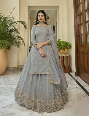 Look Attrective Partywear Heavy Designer Lehenga Choli And Dupatta In Fine Color. Lahenga Are Organza Choli Are Organza And Dupatta Is Soft Net Fabricated With Heavy Attractive Designer Embroidery Work. 