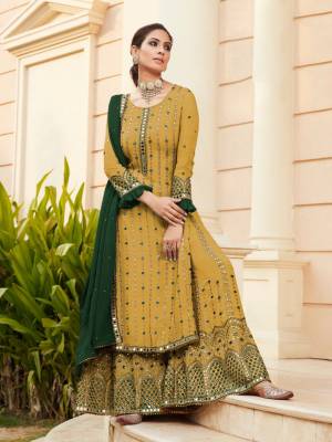 Attrective This Designer Long Length Sharara Suits In Lovely Color.?Its Pretty Designer Mirror Embroidery Work Top Is Faux Georgette Based Paired Bottom Santoon With Batterfly Faux Georgette Fabricated Dupatta Which Gives An Attractive To The Dress.