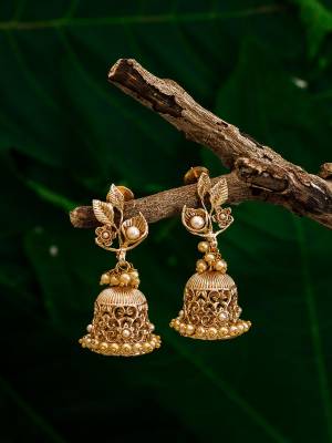 Give An Enhanced Look To Your Personality By Pairing Up This Beautiful Earring Set With Your Ethnic Attire. This Pretty Set Is In Gold Color Beautified With Kundan Work. Buy Now.