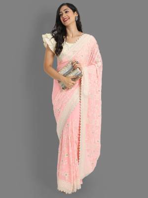 Garb This Reception Partywear Saree Are Fine Saree Paired With Blouse.This Saree Are Faux Georgette And Blouse Are Silk Based Fabric With Heavy Designer Lukhnavi Cotton And Badli Jari Embroidery Work. Buy This Pretty Saree Now.