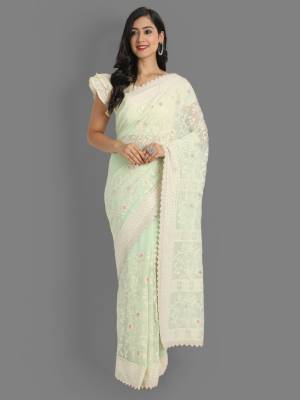 Garb This Reception Partywear Saree Are Fine Saree Paired With Blouse.This Saree Are Faux Georgette And Blouse Are Silk Based Fabric With Heavy Designer Lukhnavi Cotton And Badli Jari Embroidery Work. Buy This Pretty Saree Now.