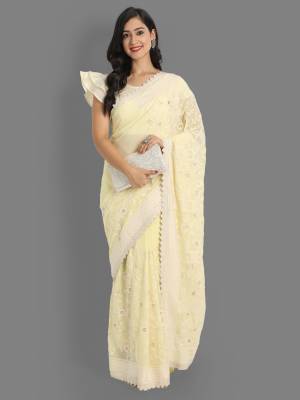 Garb This Reception Partywear Saree Are Fine Saree Paired With Blouse.This Saree Are Faux Georgette And Blouse Are Silk Based Fabric With Heavy Designer Lukhnavi Cotton And Badli Jari Embroidery Work. Buy This Pretty Saree Now.