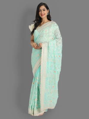 Garb This Reception Partywear Saree Are Fine Saree Paired With Blouse.This Saree Are Faux Georgette And Blouse Are Silk Based Fabric With Heavy Designer Lukhnavi Cotton And Badli Jari Embroidery Work. Buy This Pretty Saree Now.