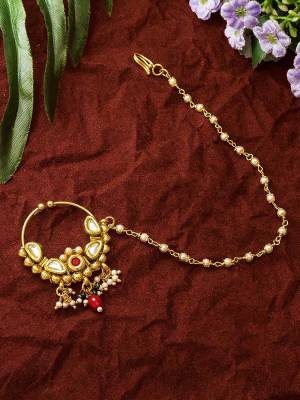 An Enhanced Look To Your Personality By Pairing Up This Beautiful Nathani With Your Ethnic Attire. This Pretty Set Is In Golden Color Beautified With Rajwadi Stylest. Buy Now.