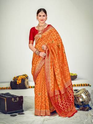 Look Attrective This Partywear Saree Are Fine Saree Paired With Blouse.This Saree Are Banarasi Silk And Blouse Are Banarasi Silk Based Fabric With Weaving Jari Designer Work. Buy This Pretty Saree Now.