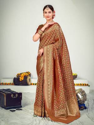 Look Attrective This Partywear Saree Are Fine Saree Paired With Blouse.This Saree Are Banarasi Silk And Blouse Are Banarasi Silk Based Fabric With Weaving Jari Designer Work. Buy This Pretty Saree Now.