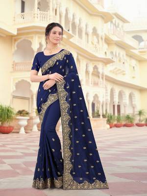 Attrective Look This Traditionl Partywear Saree Are Fine Saree Paired With Blouse.This Saree And Blouse Are Two Tone Vichitra Silk Based Fabric With Heavy Designer Jari Embroidery,Stone Work. Buy This Pretty Saree Now.