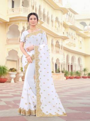 Attrective Look This Traditionl Partywear Saree Are Fine Saree Paired With Blouse.This Saree And Blouse Are Georgette Based Fabric With Heavy Designer Jari Embroidery,Stone Work. Buy This Pretty Saree Now.