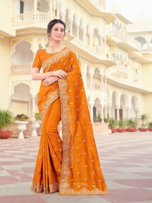 Attrective Look This Traditionl Partywear Saree Are Fine Saree Paired With Blouse.This Saree And Blouse Are Two Tone Vichitra Silk Based Fabric With Heavy Designer Jari Embroidery,Stone Work. Buy This Pretty Saree Now.