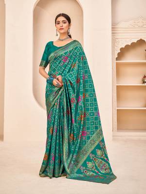 Look Attrective This Wedding Partywear Saree Are Fine Saree Paired With Blouse.This Saree And Blouse Are Banarasi Silk Based Fabric With Weaving Patola Designer Work. Buy This Pretty Saree Now.