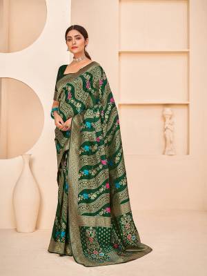 Look Attrective This Wedding Partywear Saree Are Fine Saree Paired With Blouse.This Saree And Blouse Are Banarasi Silk Based Fabric With Weaving Patola Designer Work. Buy This Pretty Saree Now.