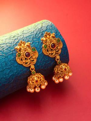 Attrective Give An Enhanced Look To Your Personality By Pairing Up This Beautiful Earring Set With Your Ethnic Attire. This Pretty Set Is In Gold Color Beautified With Stone And Pearl Work. Buy Now.